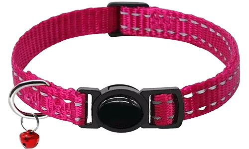 Reflective breakaway pink cat collar with round safety buckle, small bell, and silver D-ring for cat tags and cat leads.